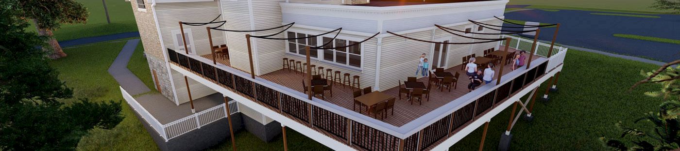 A modern white house on stilts with a wraparound deck, multiple levels, outdoor seating, and a scenic sunset backdrop.