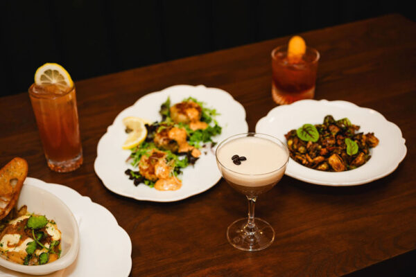 Happy-Hour-Gallery assortment of cocktails and happy hour dishes