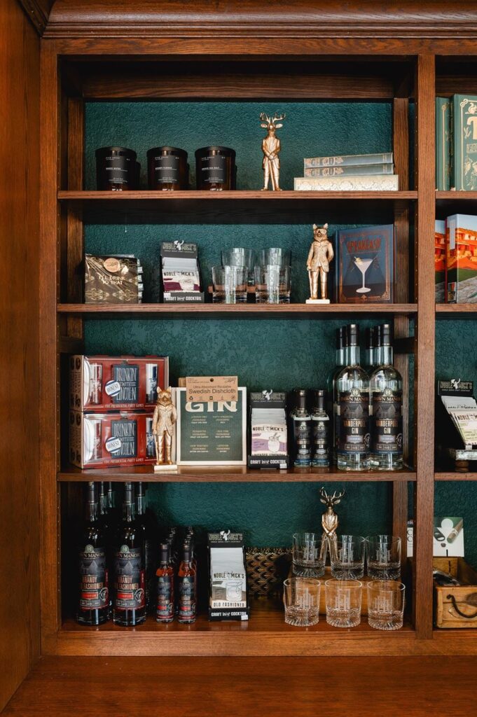 Dawn Manor branded merchandise on shelves at the Sundries Shoppe